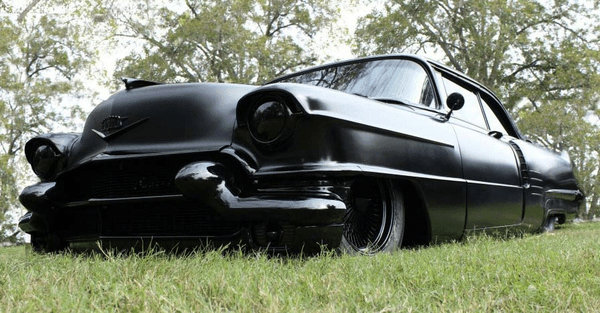 A 1956 Cadillac restored & painted a VERY flat black by the owner/operator, Tim Haase. (Pic taken before final paint job!)