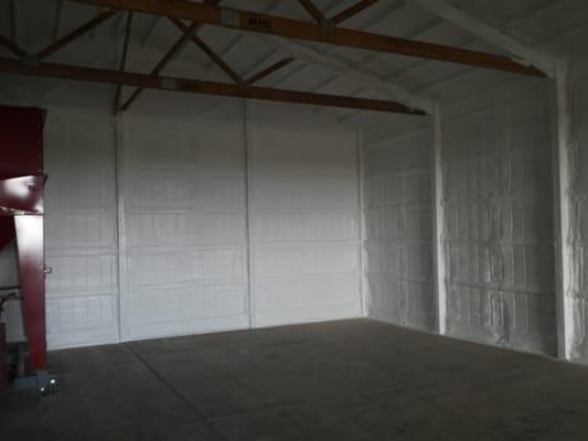 Foamed pole barn, painted white.