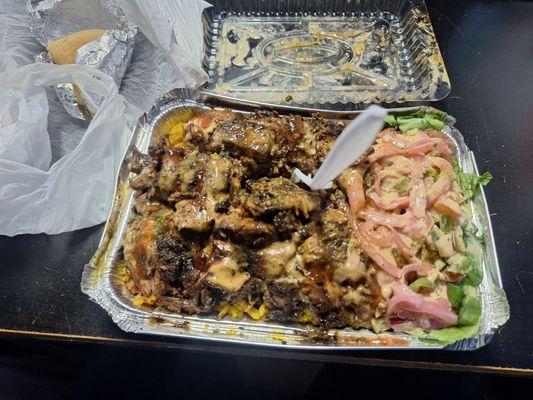 Jerk chicken with rice and a pico de gallo salad Yummy