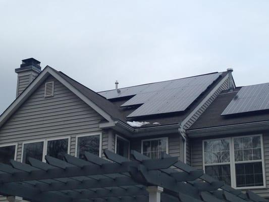 The back roof of a house in Annapolis. Note that we don't put conduit over the side of the roof...