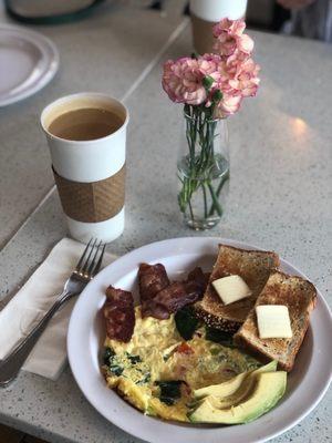 Omelette, bacon, toast & real butter.   Decaf Americano