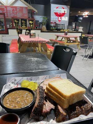 Three meat combo (Brisket, spare ribs & turkey) with beans.