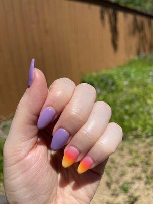 Natural nails with ombré and solid dip. The ombré has the same purple, pink, orange, and yellow.