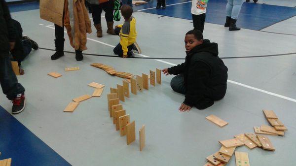 Using dominoes to teach kids how to apply their STEM++ skills.