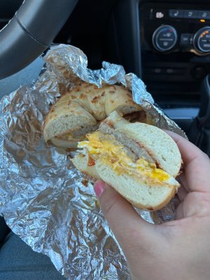 Two Sausage Patties piled high with lots of melted cheese and egg - good quality bagels and generous portions!