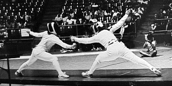 Coach Hope (right) USA Silver Medalist, fencing in the National Championships.