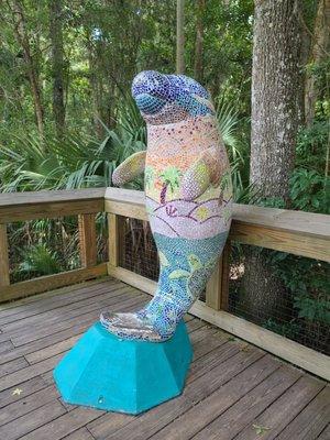 Manatee made out of tiles.