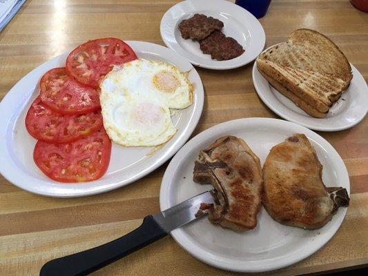 Pork chops (no longer on the menu), eggs and sausage patties.