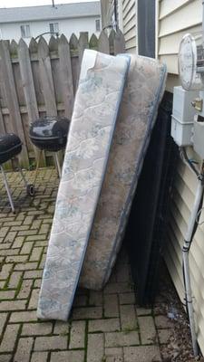 The mattress and box spring LL Elf Services moved and left outside in rain for 3 days.