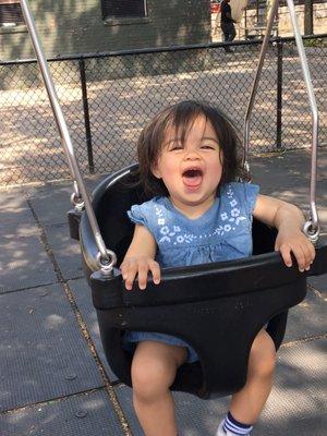 Swinging at the park.