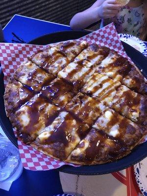 Saucy Pig (pulled pork) pizza