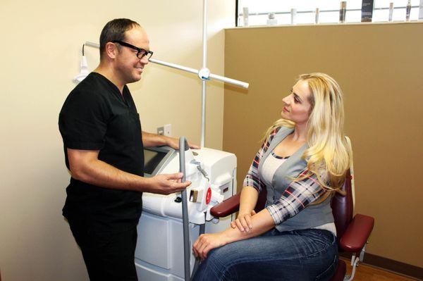 Dr. Ian Swift with a patient for laser cosmetics.