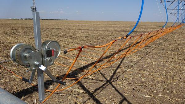 Patented adjustable Winch Assembly system. This is used to adjust the row spacing of the Dragon-Line relative to the planted crop.s