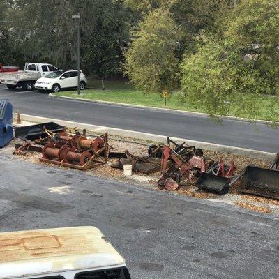 Some used implements out front for sale.