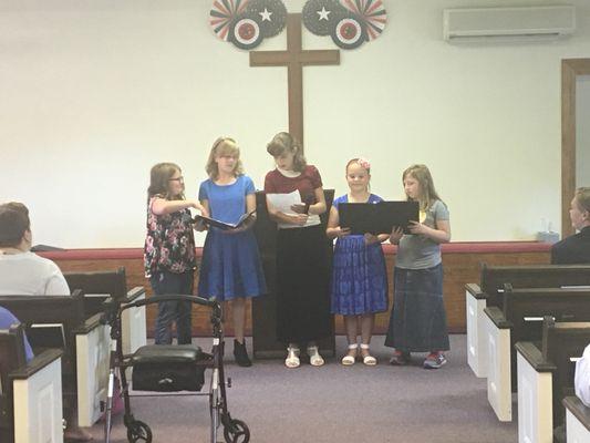 Girls singing for First Responders Appreciation Day.