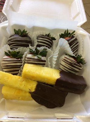 Variety box including dipped berries and dipped pineapple.