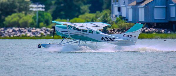 Coastal Seaplanes taking off from Chisman Creek