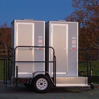 Dual VIP Mobile Restrooms for rent, Trailer mounted. Solar Powered, flushing toilet w/ sink. Perfect for events and weddings.