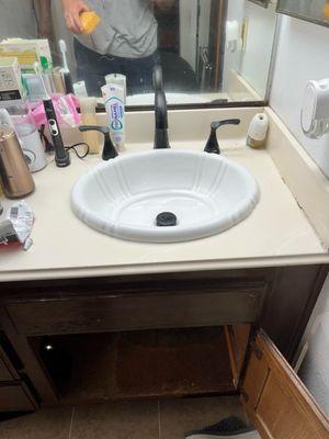 Sink and faucet installed.