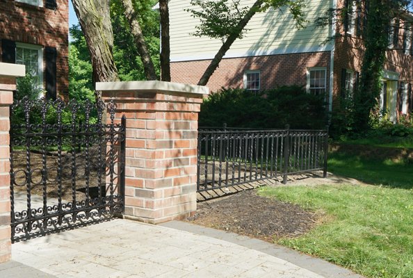 Dave took some design elements from our 120 year old gate and incorporated them into our new fence!