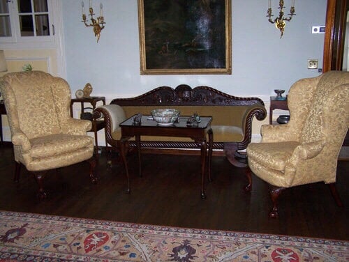 Antique wing chairs and sofa