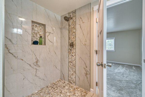 Beautiful remodeled curbless walk in shower.