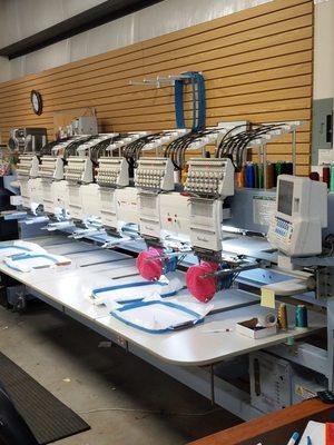 One of our two 6 head embroidery machines.