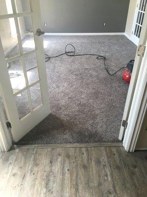 Vinyl plank and carpet