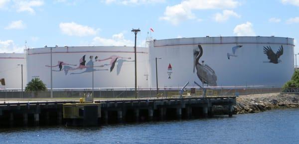 More murals painted on furl storage tanks at Port Tampa Bay.