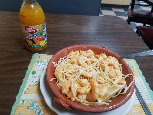 Pasta, shrimp, wirh garluc and oil with delicious bottle of Pura Fruta mango and papaya