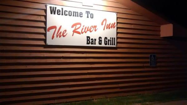 River Inn sign