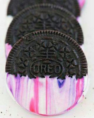 Crazy fun oreos...oreos dipped in white chocolate swirled with fun colors. Have fun with your food $3 a dozen.