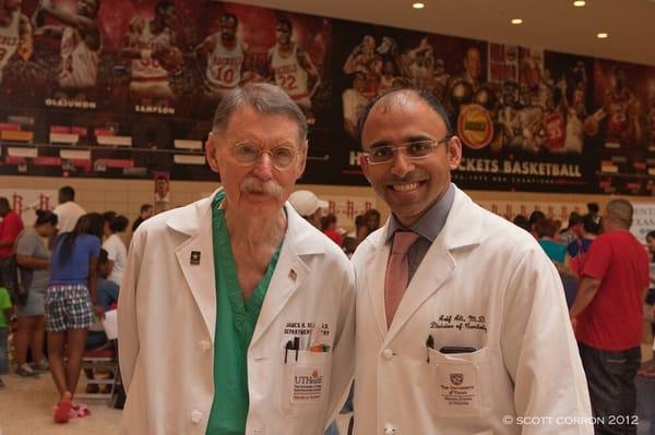 Dr Red Duke and Dr Ali. Picture taken at the Toyota Center for Houston Rockets Annual Health Fair hosted by Houston Cardiology Consultants.