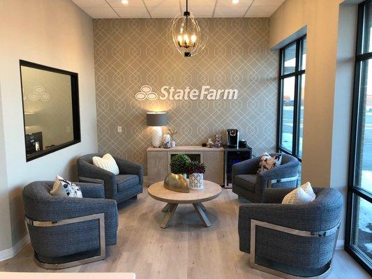 Warm Reception area with beverage center for customers waiting to talk about their personal insurance.