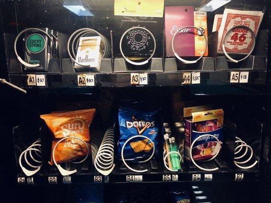 Best vending machine - cigarettes, lighters, tampons, guitar strings, and Doritos.