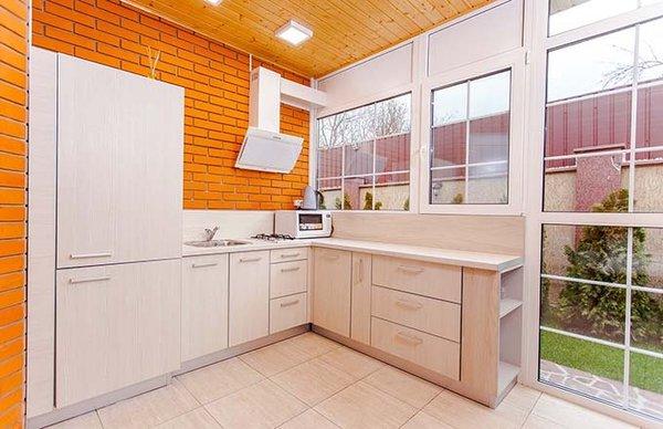 orange tile design in kitchen