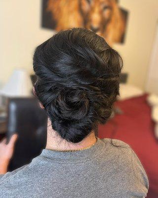 Who doesn't love a beautiful updo?! It's perfect for summer time and pairs well with a simple but elegant dress!

Hair by Bianca