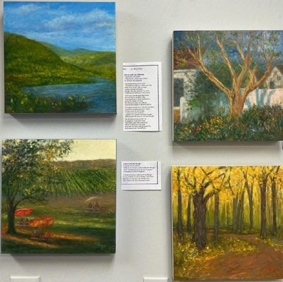 A selection of four paintings by owner  Mary Reilly.