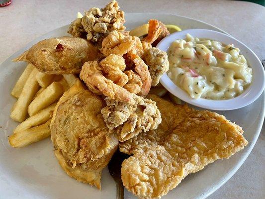 Fried seafood sampler platter with side of crab au gratin