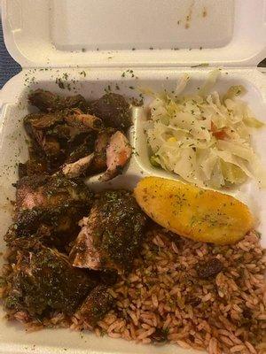 Brown Stew Chicken in the small section. Jerk Chicken on top of Rice and Peas