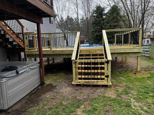 A deck we built around a pool