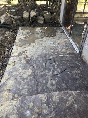 This is what my patio looked like after the second time they came out to "fix it". And they just left it like this.