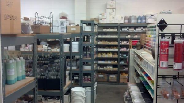 Nice selection of tools, clay, and miscellaneous supplies