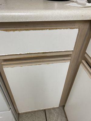 More peeling cabinets