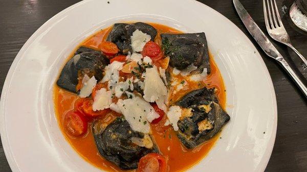 Lobster ravioli with squid ink pasta