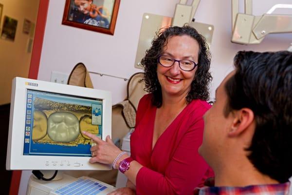 Dr. Amy shares a joke while explaining a CEREC restoration.