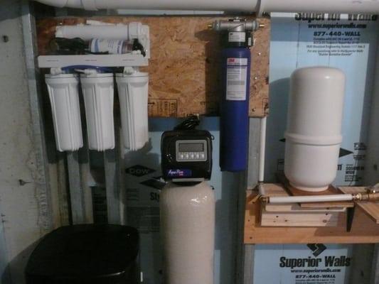 RO system left, water softener , middle, 3m carbon water filter for the entire home.