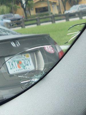 Damage done by their truck to my windshield.