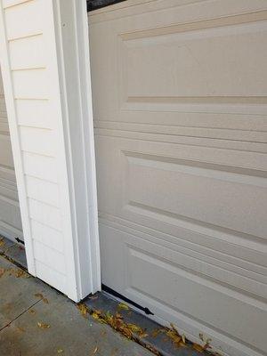 AFTER - no more black mold on the rubber garage door seal.