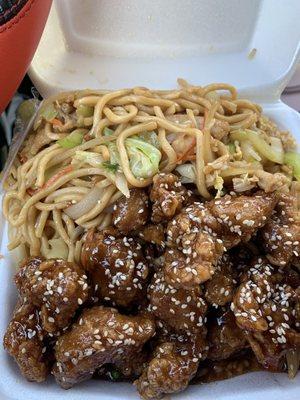 Sesame chicken combo with Pork fried rice and chicken chow mein . Also comes with a egg roll